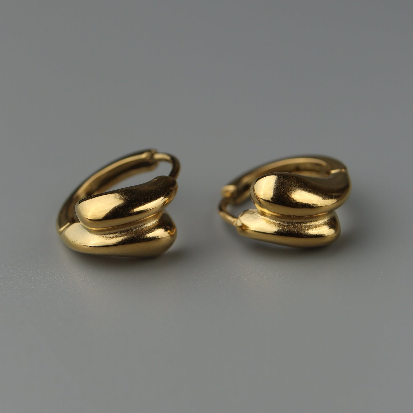 OLLI Tear Drop Clip Earrings