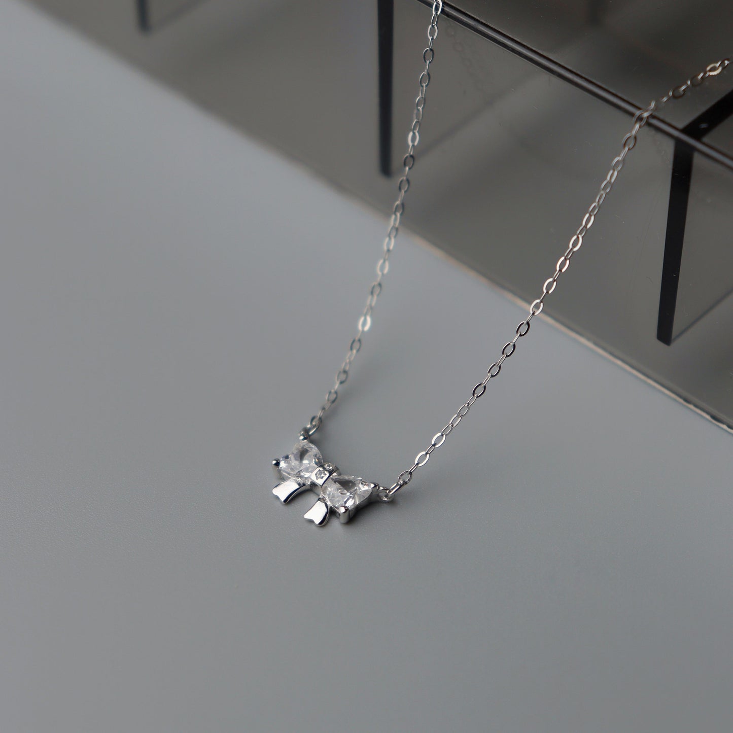 CADE S925 Silver Mini Bow Tie Ribbon Pendant SN00028