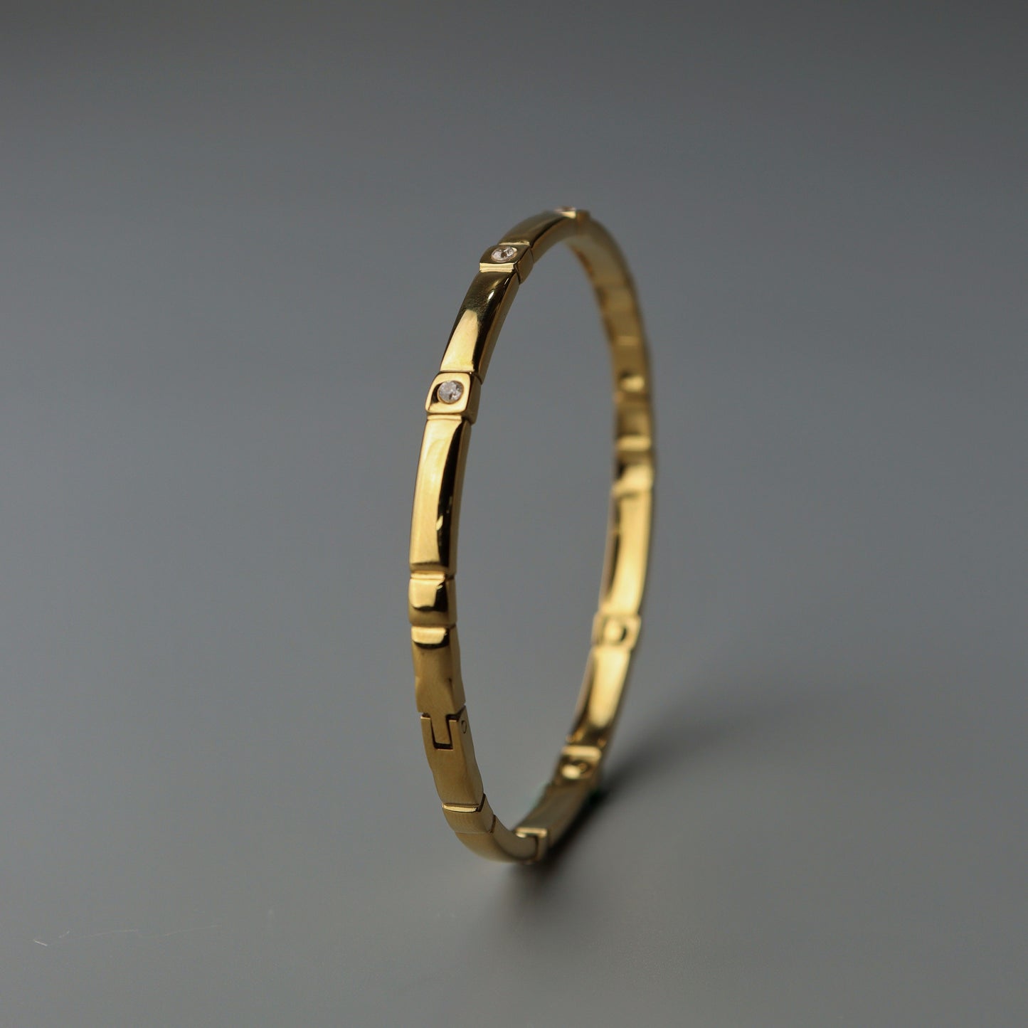 LUCA Crystal Linked Bangle Bracelet