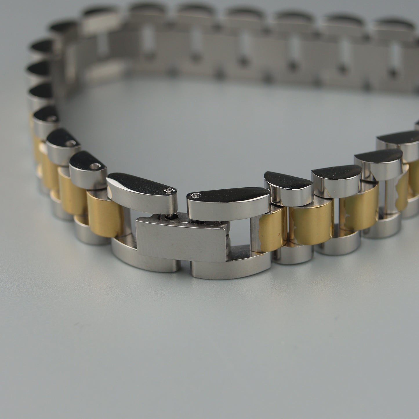 CYRUS Two Tone Strap Clasp Lock Bracelet