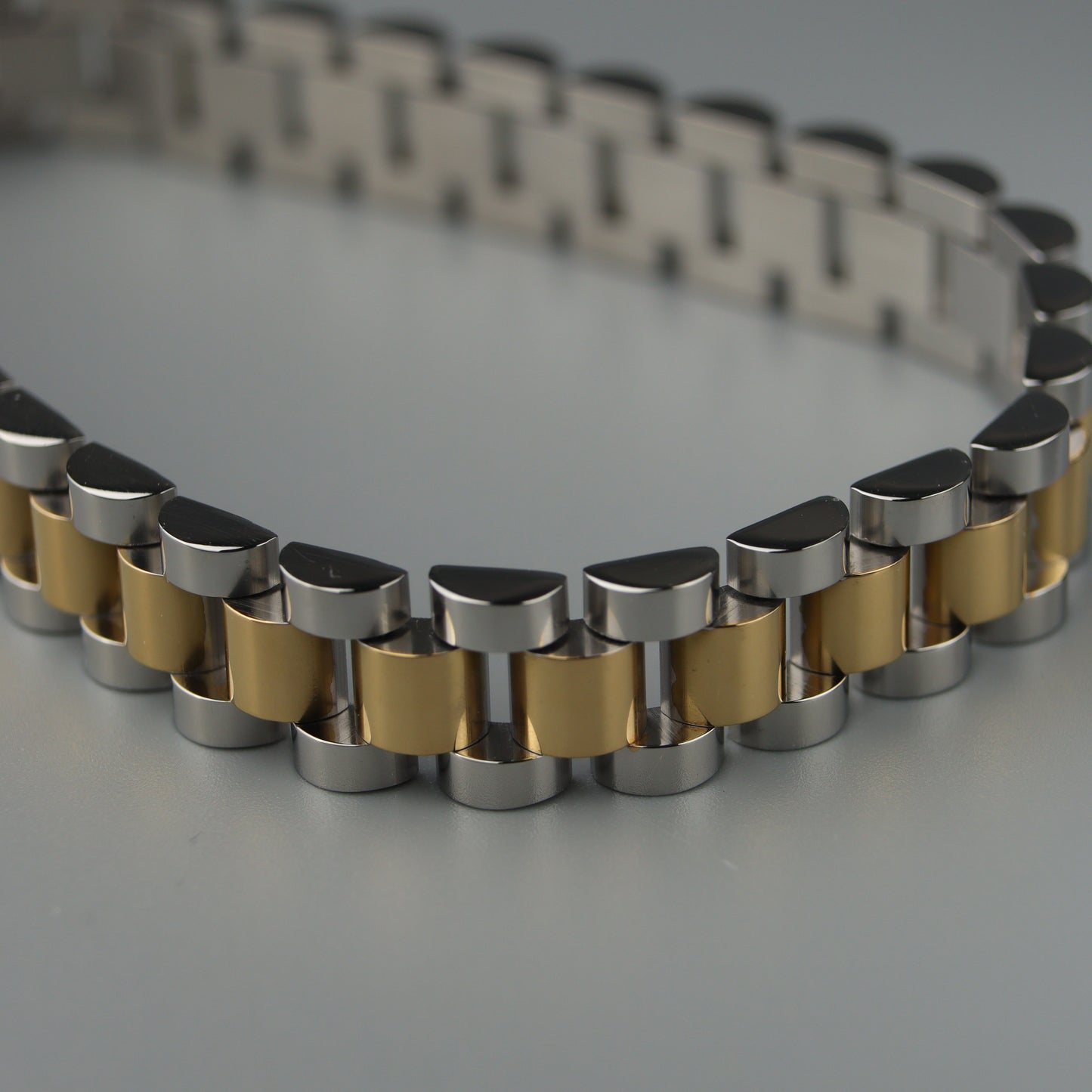CYRUS Two Tone Strap Clasp Lock Bracelet
