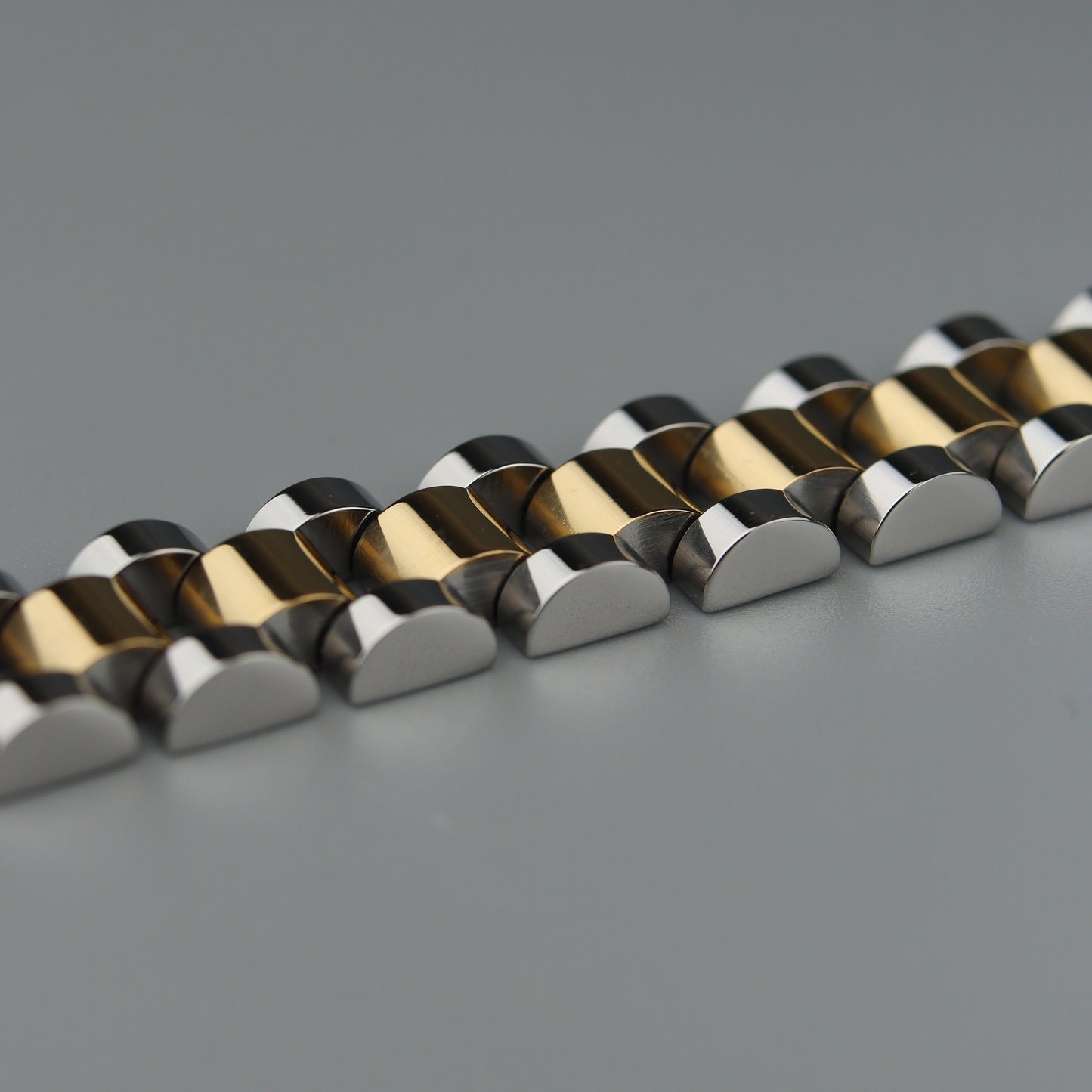 CYRUS Two Tone Strap Clasp Lock Bracelet