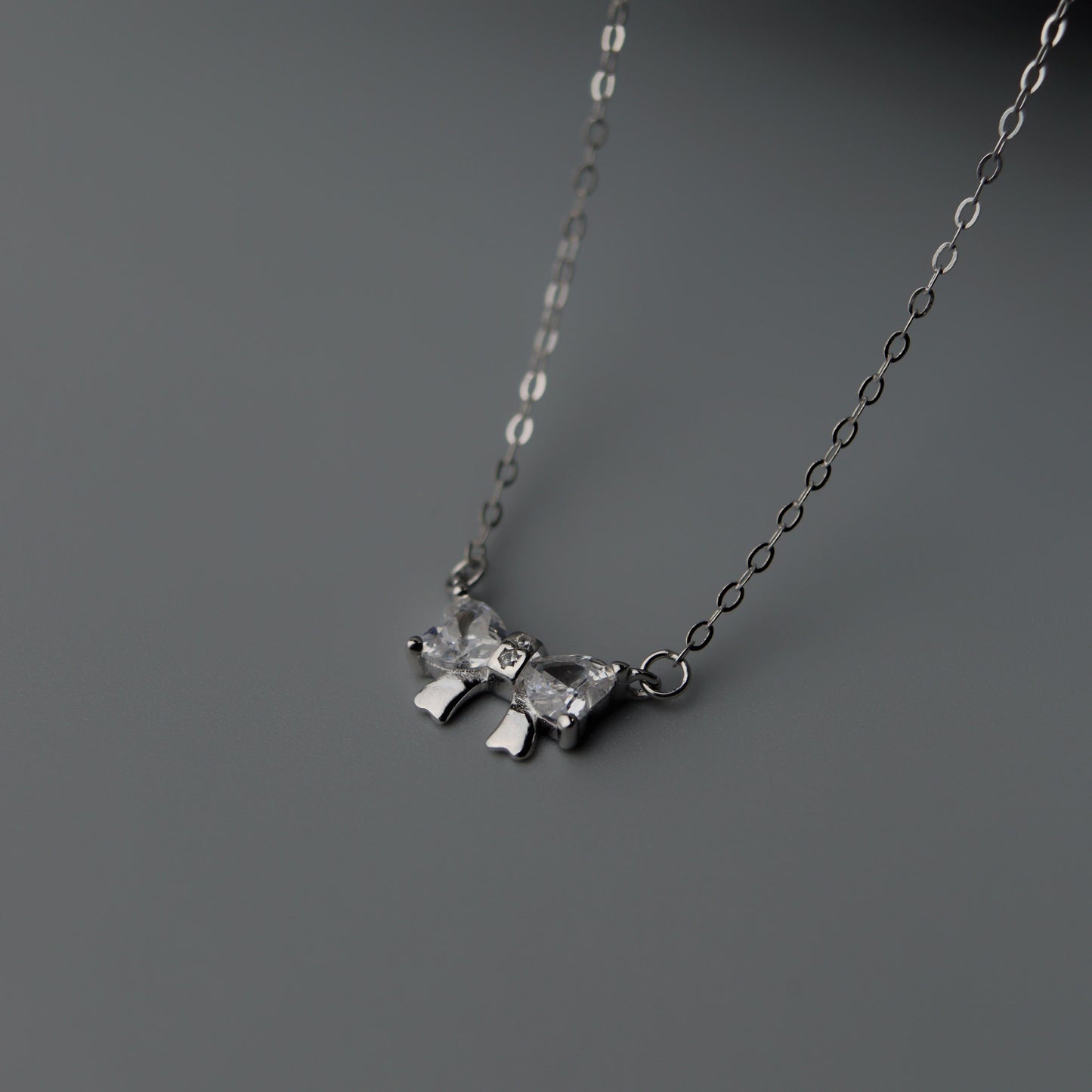CADE S925 Silver Mini Bow Tie Ribbon Pendant SN00028